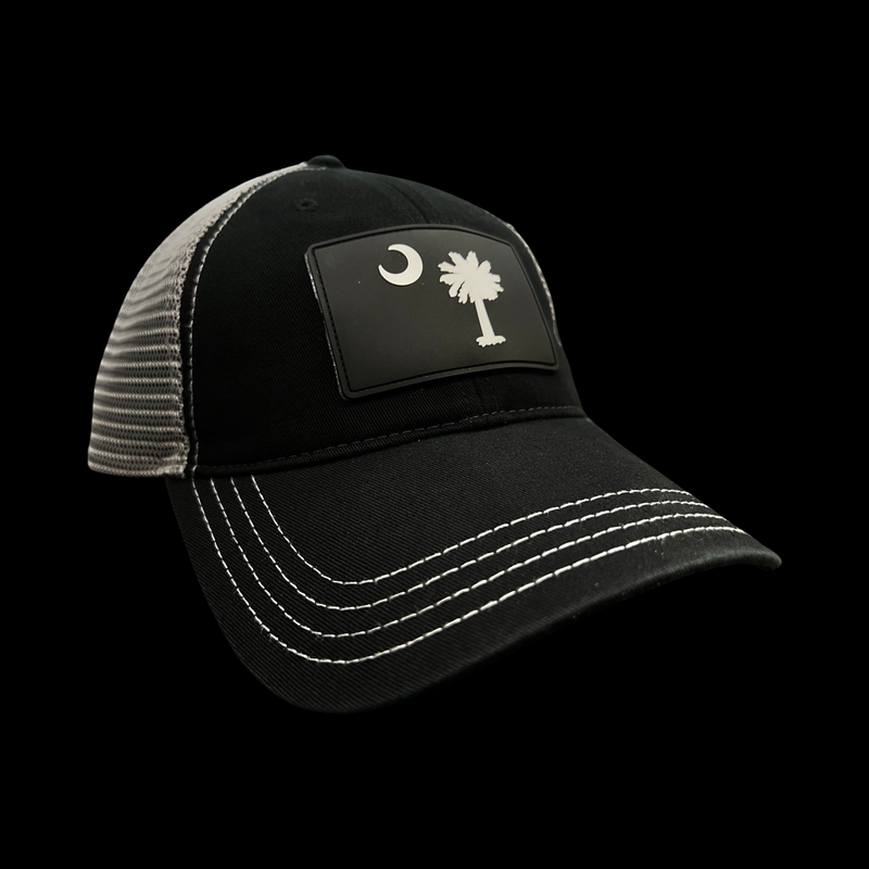 864 Richardson Performance PVC Patch Relaxed Black Steel Trucker Hat