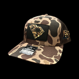 843 Richardson Bark Brown Duck Camo Blackout Performance PVC Patch Lowcountry Trucker