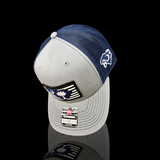 803 Richardson Heather Navy Performance PVC Trucker Hat