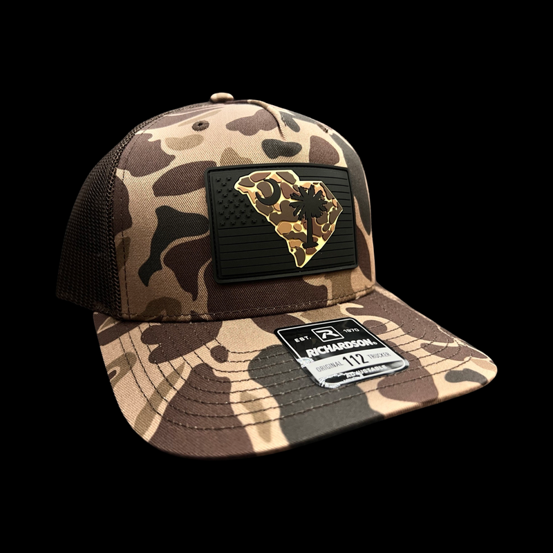 843 Richardson Bark Brown Duck Camo Blackout Performance PVC Patch Lowcountry Trucker