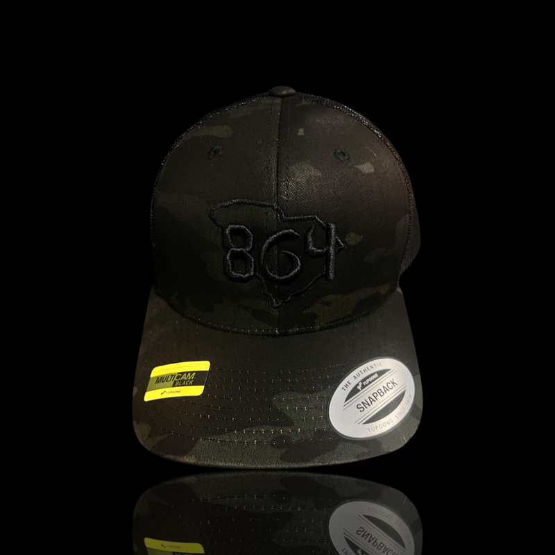 864 Yupoong Black Camo Trucker