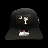 803 Richardson Blackout Palmetto Moon Performance PVC Patch Trucker Hat