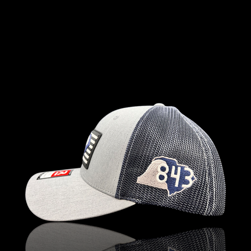 843 Richardson Flexfit Heather Grey Navy Performance PVC Fitted Trucker Hat