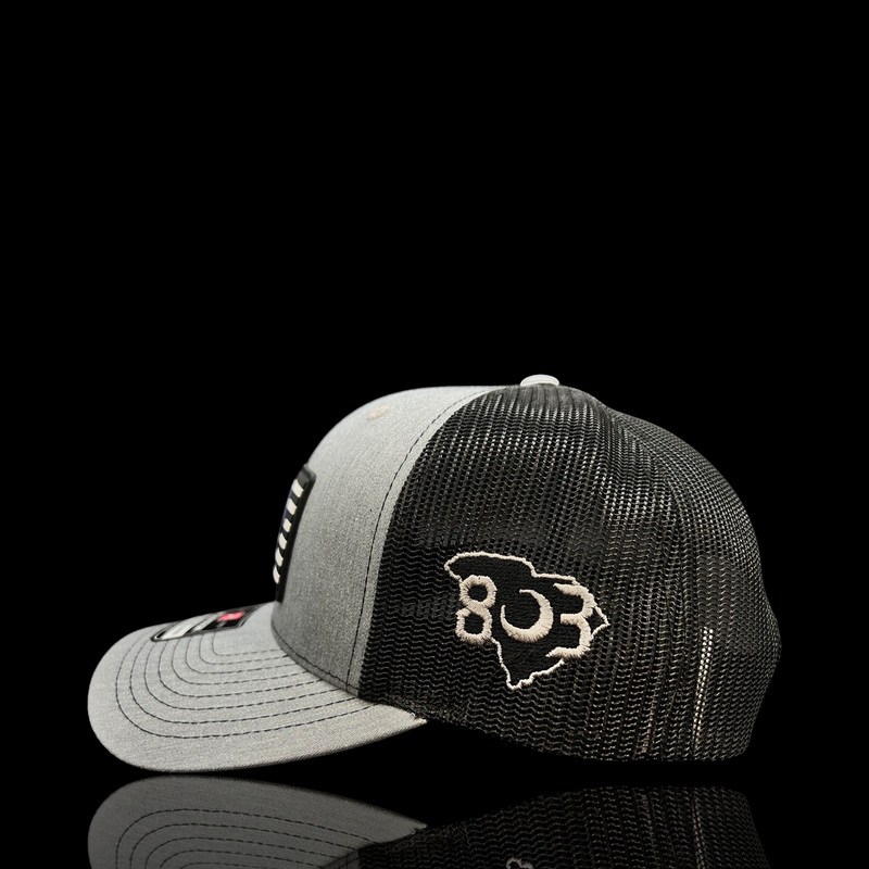 803 Richardson Performance PVC Patch Heather Black Trucker Hat