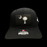 864 Richardson Blackout Palmetto Moon Performance PVC Patch Trucker Hat