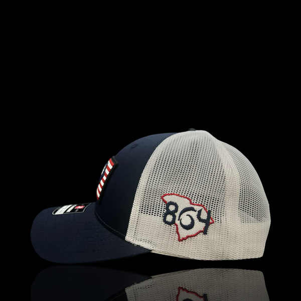 864 Richardson 115 RWB Performance PVC Patch Navy White Low Profile Trucker Hat