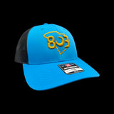 803 Richardson 115 Low Profile Cyan Black Trucker Hat