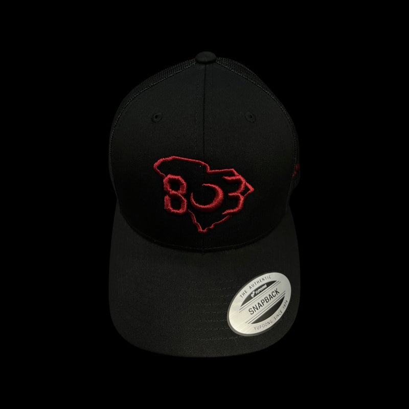 803 Yupoong Carolina Black Widow Garnet Trucker Hat