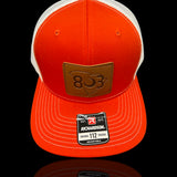 803 Richardson Orange - White Leather Patch Trucker