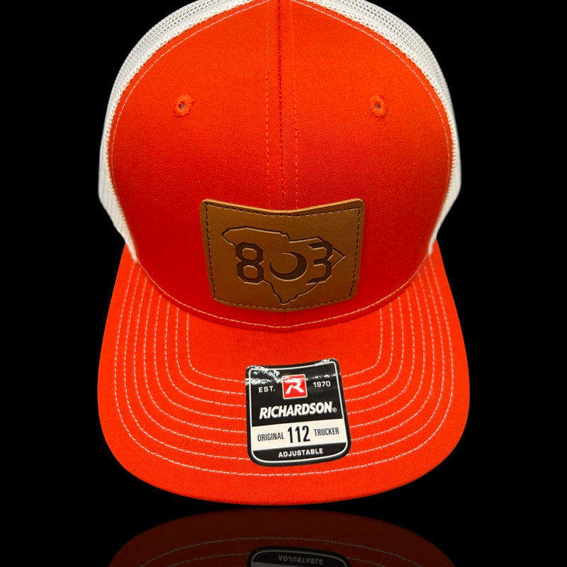 803 Richardson Orange - White Leather Patch Trucker