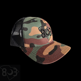 803 Yupoong Camo Black Trucker