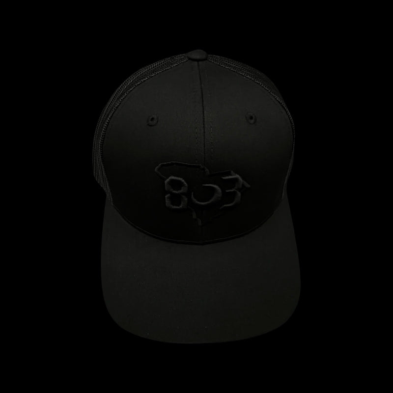 803 Yupoong Black Trucker - silver logo