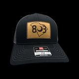 803 Richardson Black and Steel Genuine Leather Patch Trucker