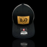 803 Richardson Black and Steel Genuine Leather Patch Trucker