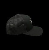 803 Yupoong Black Trucker - silver logo